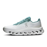 Men's On Cloudtilt active lifestyle sneakers in dark gray with mesh and cushioned soles, designed for versatile performance.