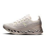 Women's On Cloudsurfer Max road running shoes with a sleek design and cushioned sole, ideal for comfortable running.