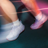 Women's ASICS Novablast 5 Tokyo neutral daily trainers with sleek design and supportive cushioning.