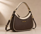 Brown and cream two-tone Bagsor handbag with adjustable strap, showing front view with zip closure and stylish design.