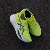 Men's ASICS Sonicblast tempo trainers in blue with cushioned soles and breathable mesh uppers, designed for running and training.