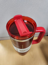 Stanley Quencher H2.0 FlowState 40 oz tumbler with lid, stainless steel design, ideal for keeping beverages hot or cold.