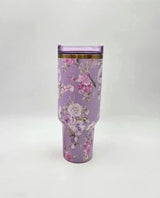 Stanley x LoveShackFancy Quencher H2.0 FlowState Tumbler 40 oz in floral design with a lid and straw, durable stainless steel construction.