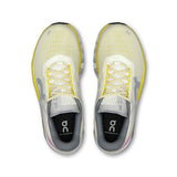 Women's On Cloudmonster 2 road running shoes in limited edition ivory and lime with breathable mesh and cushioned soles.